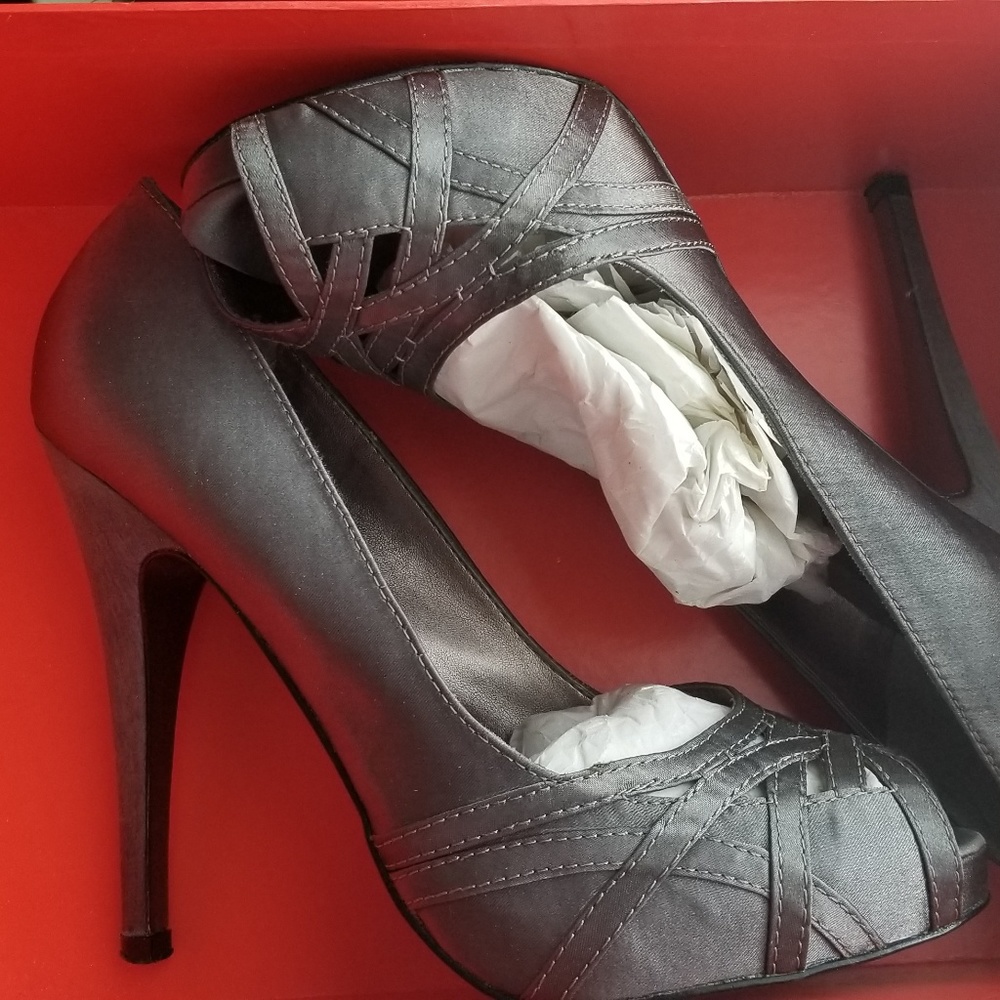 Grey satin peep toe pump.